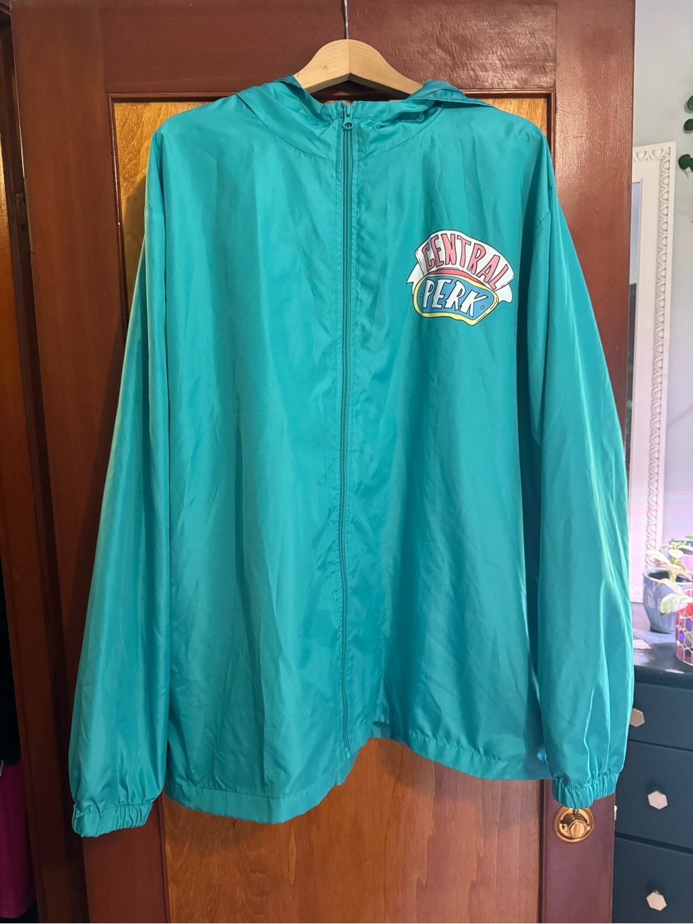 Central Perk Teal Hooded Rain Jacket